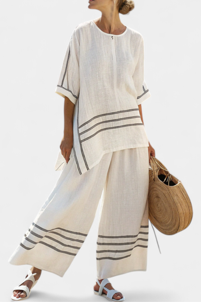 Lilibet – Sophisticated Striped Asymmetric Top and Bold Trousers